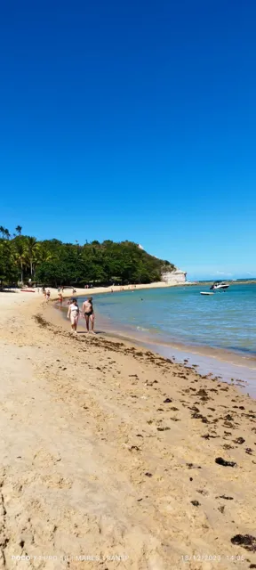 Pés na areia